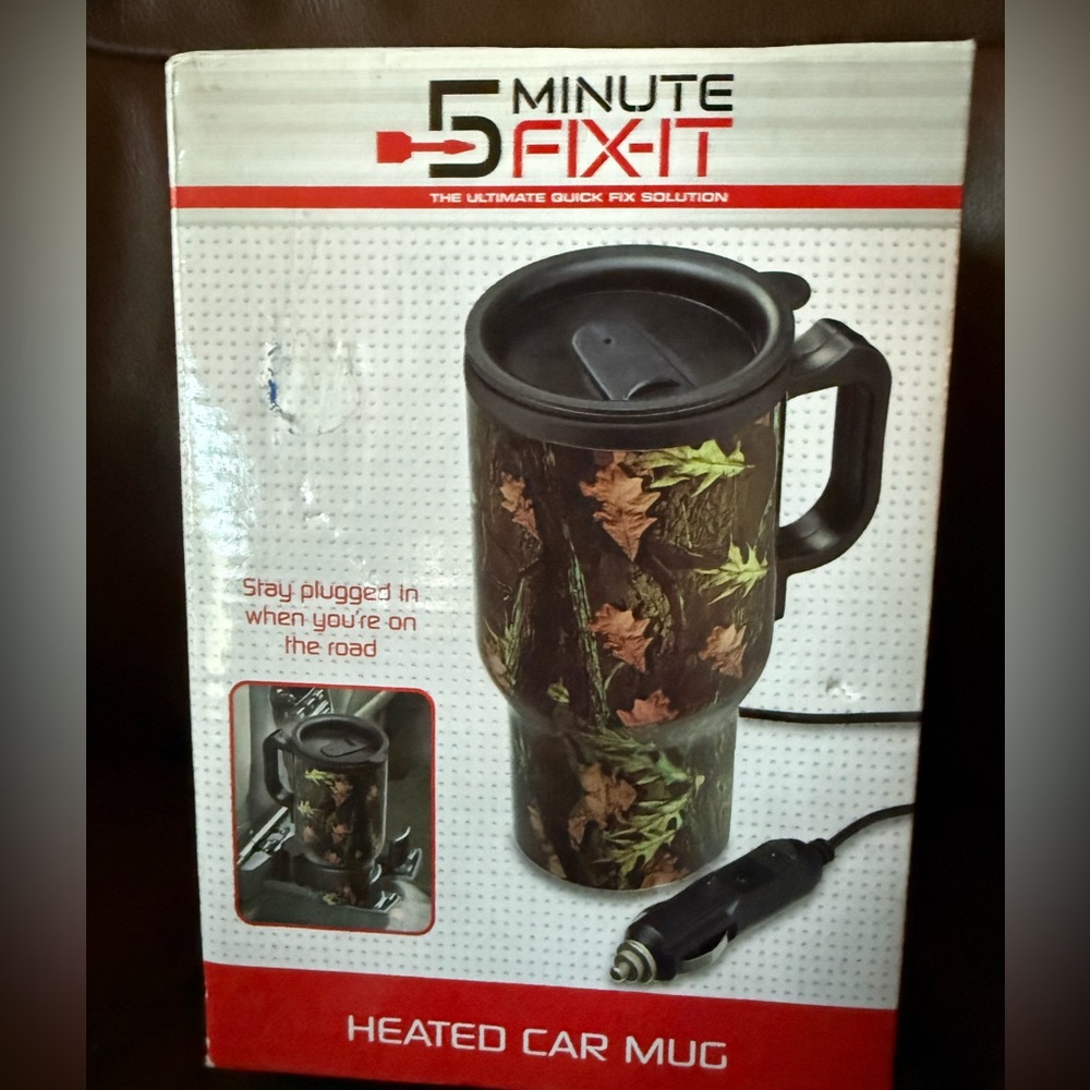 NIB 5-minute Fix It heated car mug includes car adaptor and instructions.